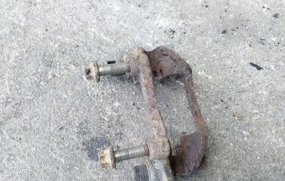 Opel Astra G Brake caliper pad carrier rear 