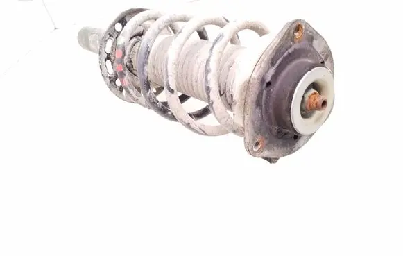 Volkswagen Caddy Front shock absorber with coil spring