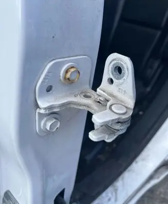 Rear door upper hinge