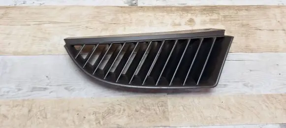 Mitsubishi Colt Front bumper upper radiator grill MN127774
