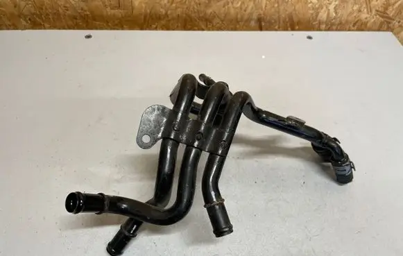 Volkswagen Golf VII Engine coolant pipe/hose 04L121064AC