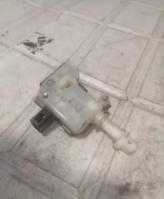 Fuel tank cap lock motor