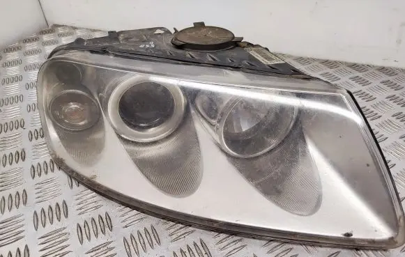 Volkswagen Touareg I Headlight/headlamp 7L6941016CE