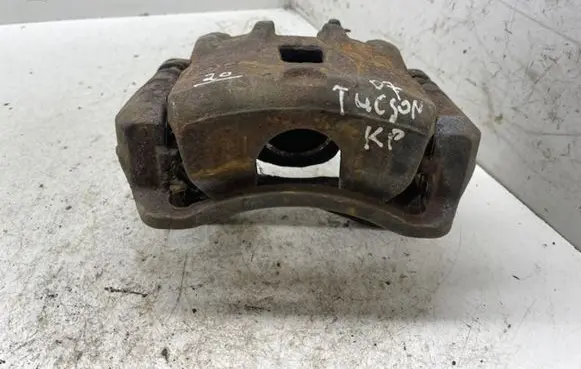 Hyundai Tucson JM Front brake caliper