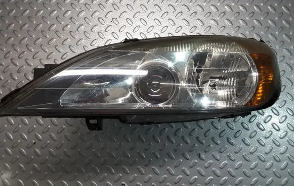 Nissan Primera Headlight/headlamp 89003040 260609F500