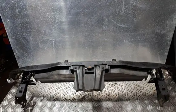 Radiator support slam panel