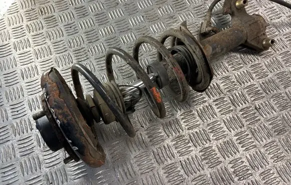 Nissan Primera Front shock absorber with coil spring