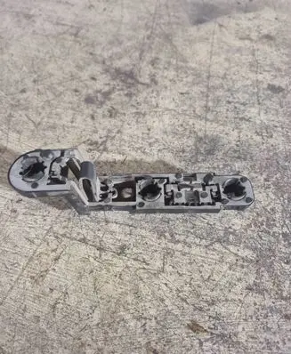 Tail light bulb cover holder