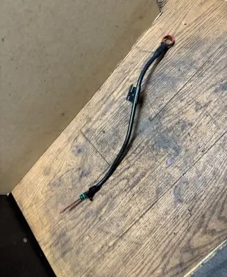 Oil level dip stick