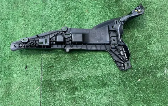 Tesla Model S Bumper support mounting bracket corner 100927300D
