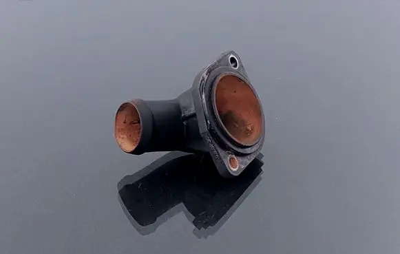 Thermostat/thermostat housing