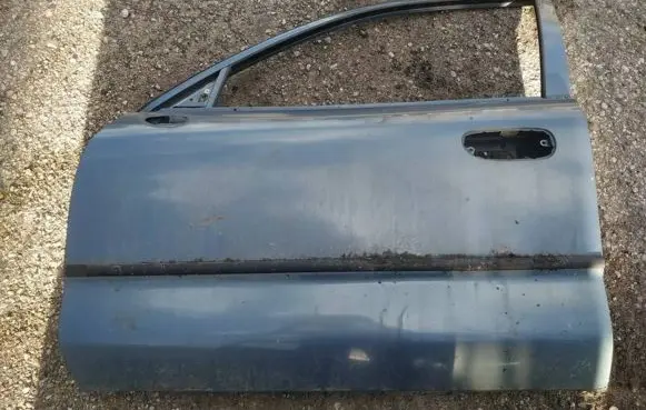 Mitsubishi Carisma Front door melynos