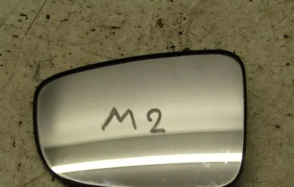 Mazda 2 Wing mirror glass DA9K214