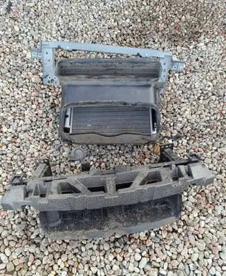 Radiator support slam panel