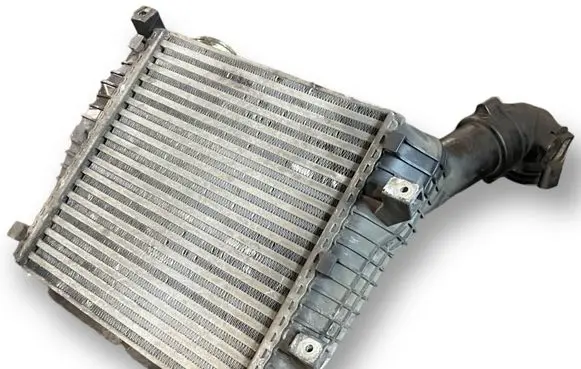 Volkswagen Touareg I Intercooler radiator 7L0117339
