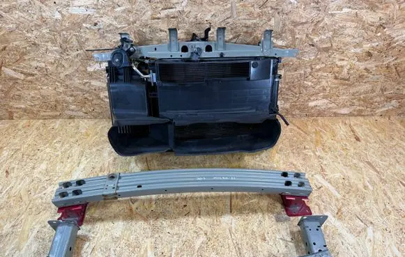 Radiator support slam panel