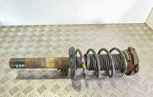 Volkswagen Golf V Front shock absorber with coil spring 1K0413031CR
