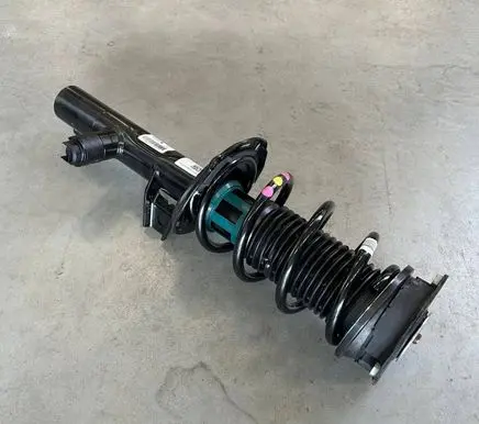 Volkswagen Golf VIII Front shock absorber with coil spring 5WA413032AC 5WA412022KC