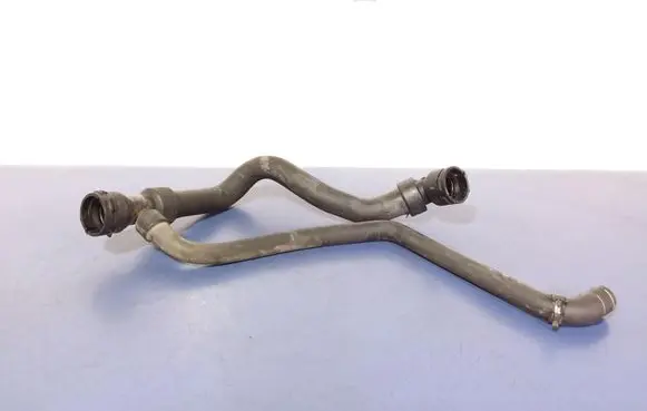 Volkswagen PASSAT B5 Engine coolant pipe/hose 8D0121055J