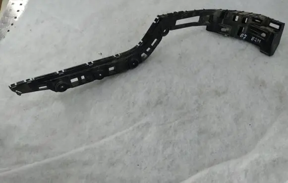 Volkswagen PASSAT B7 Bumper support mounting bracket corner 3AF807394