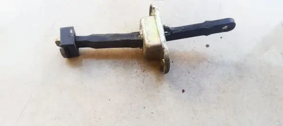 Mazda 626 Front door check strap stopper 