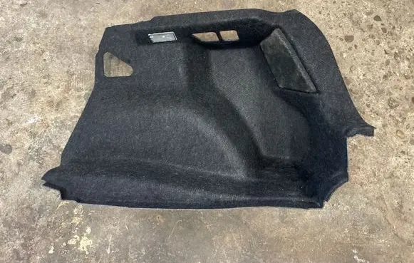 Trunk/boot lower side trim panel