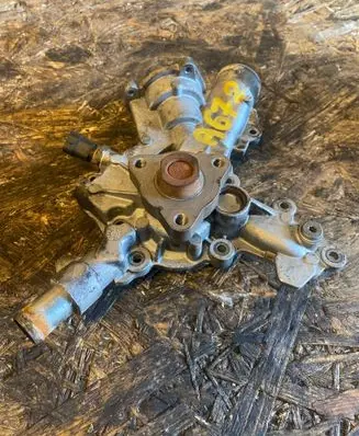 Opel Tigra B Water pump 7C958 T4GAT