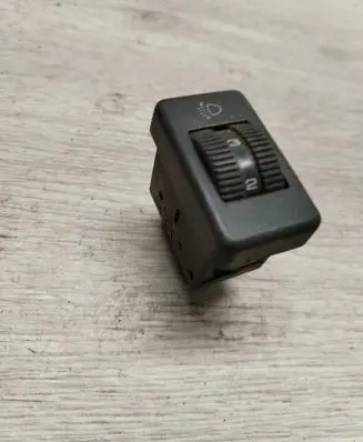 Headlight level height control switch