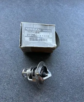 Thermostat/thermostat housing