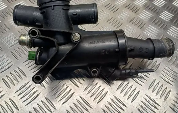 Thermostat/thermostat housing