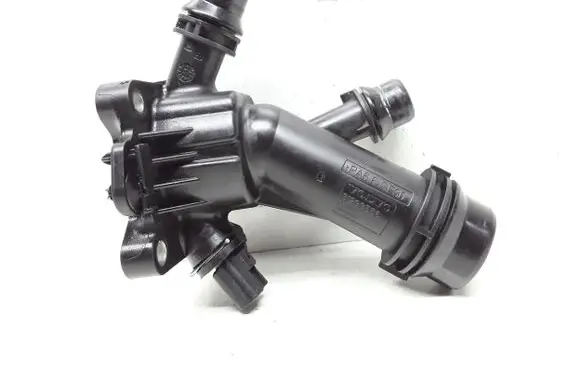 Thermostat/thermostat housing