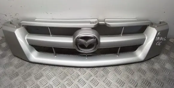 Mazda Tribute Front bumper upper radiator grill 5T248150