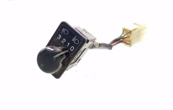 Subaru Impreza I Headlight level height control switch