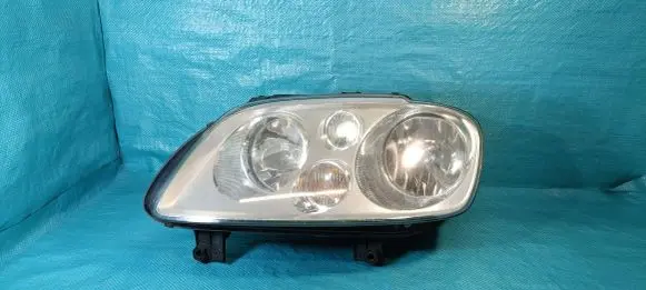 Volkswagen Touran I Headlight/headlamp 1T0941005F 0301205201
