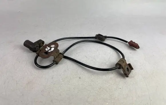 Subaru Legacy ABS brake wheel speed sensor 27540AE020