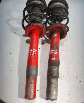 Front shock absorber with coil spring