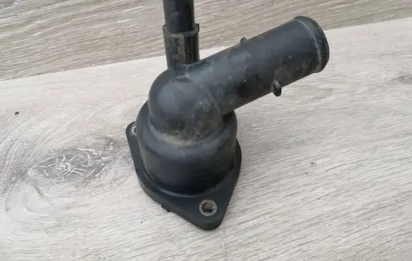 Thermostat/thermostat housing