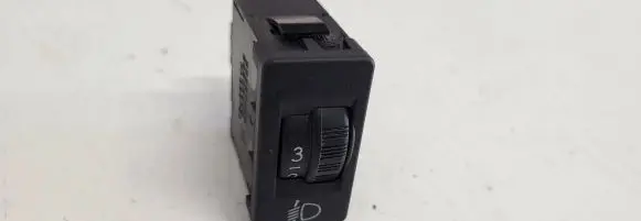 Headlight level height control switch