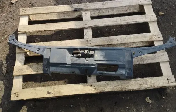 Top upper radiator support slam panel