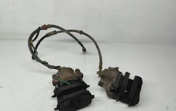 Volkswagen Golf V Front brake caliper