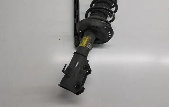 Opel Zafira C Front shock absorber/damper 13474031