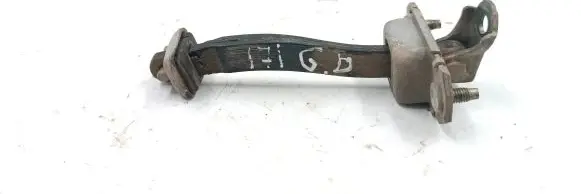 Subaru Legacy Rear door check strap stopper