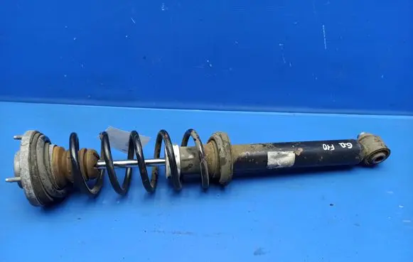 BMW 5 F10 F11 Rear shock absorber with coil spring 6775735 33506775735 735128141500