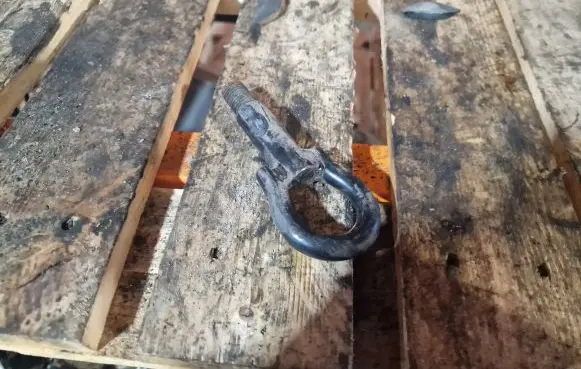 Towing hook eye