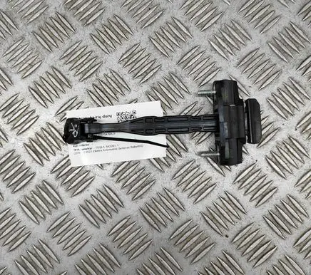 Front door check strap stopper