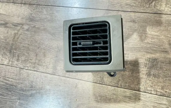 Dashboard side air vent grill/cover trim