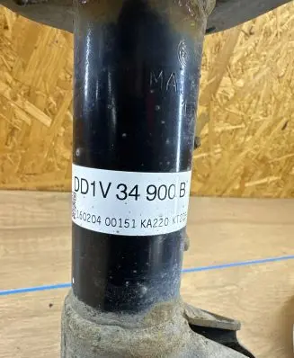 Front shock absorber with coil spring