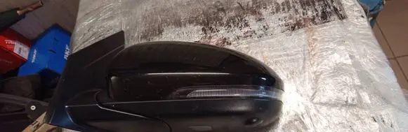 Front door electric wing mirror