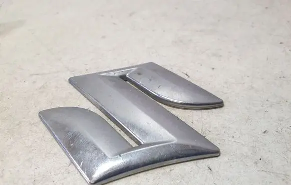 Suzuki Swift I Manufacturer badge logo/emblem 