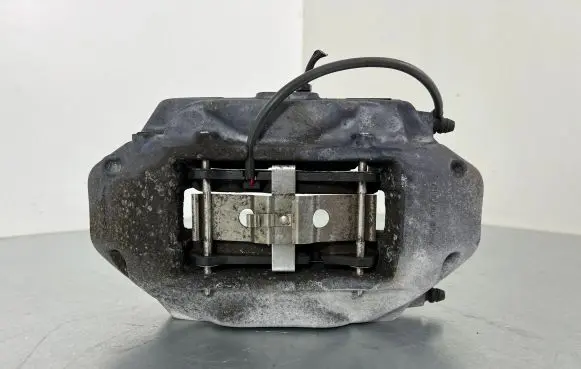 Volkswagen Touareg II Front brake caliper 7P6615105AE